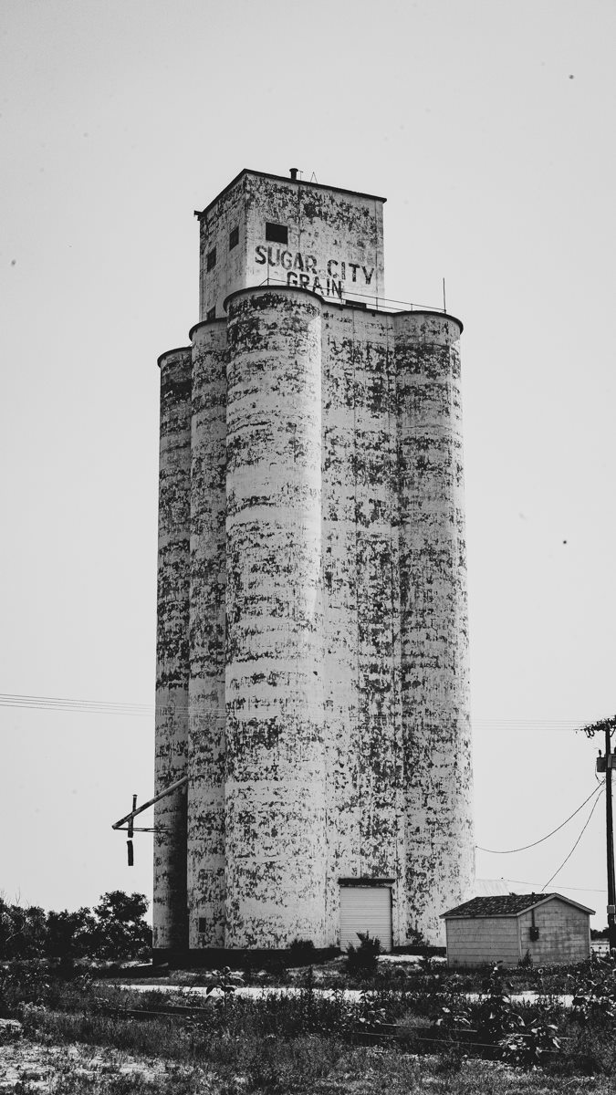 black and white picture of sugar silo