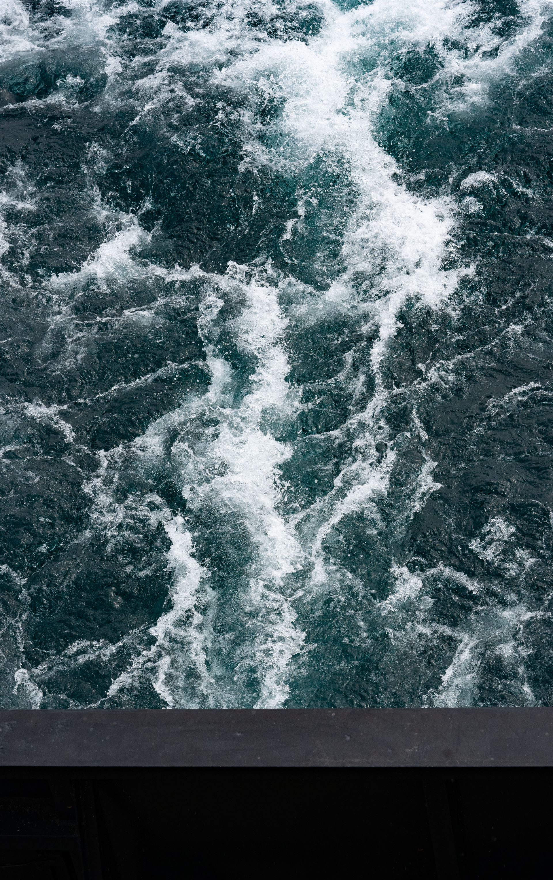 Turbulent water behind boat