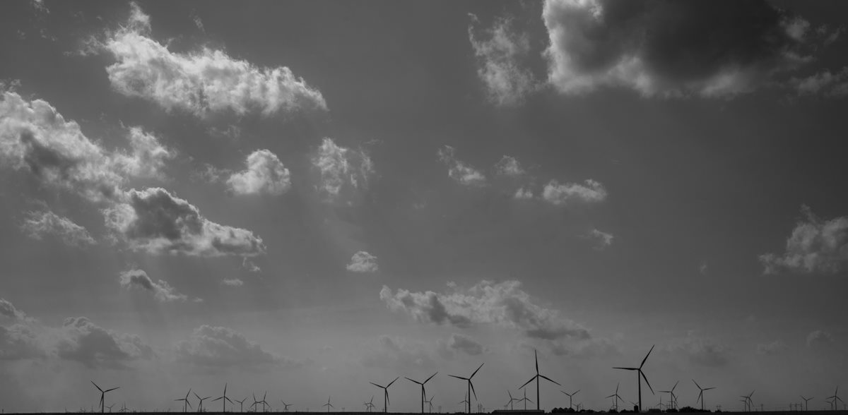 windmills across sky