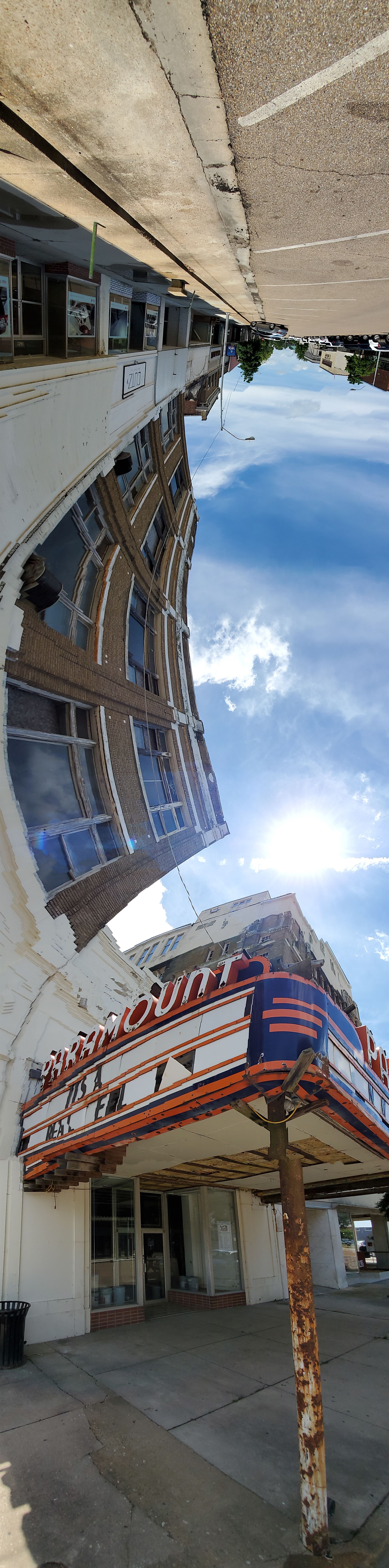 panorama of street with old theater in a vertical orientaion